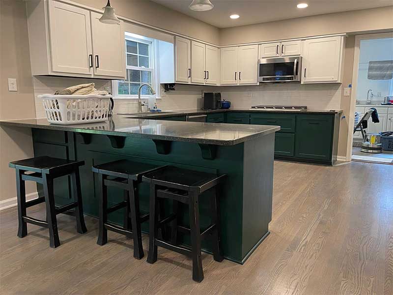 Refinished hardwood floor in a kitchen in Bethesda, Maryland