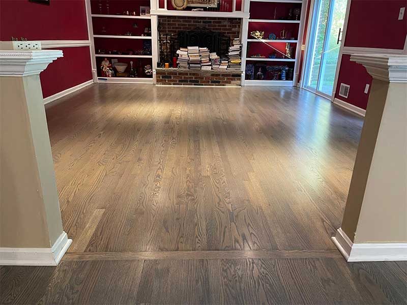 Refinished hardwood floors through the living area of a Bethesda, Maryland home
