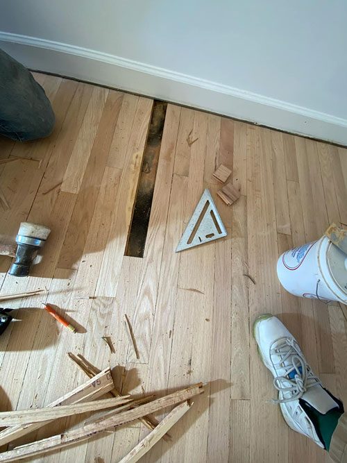 Hardwood board removal and repair work