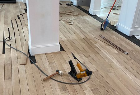 Hardwood flooring installation with a flooring nailer