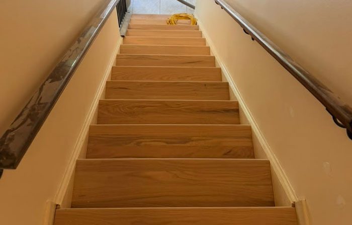 Refinished oak stair treads and handrail